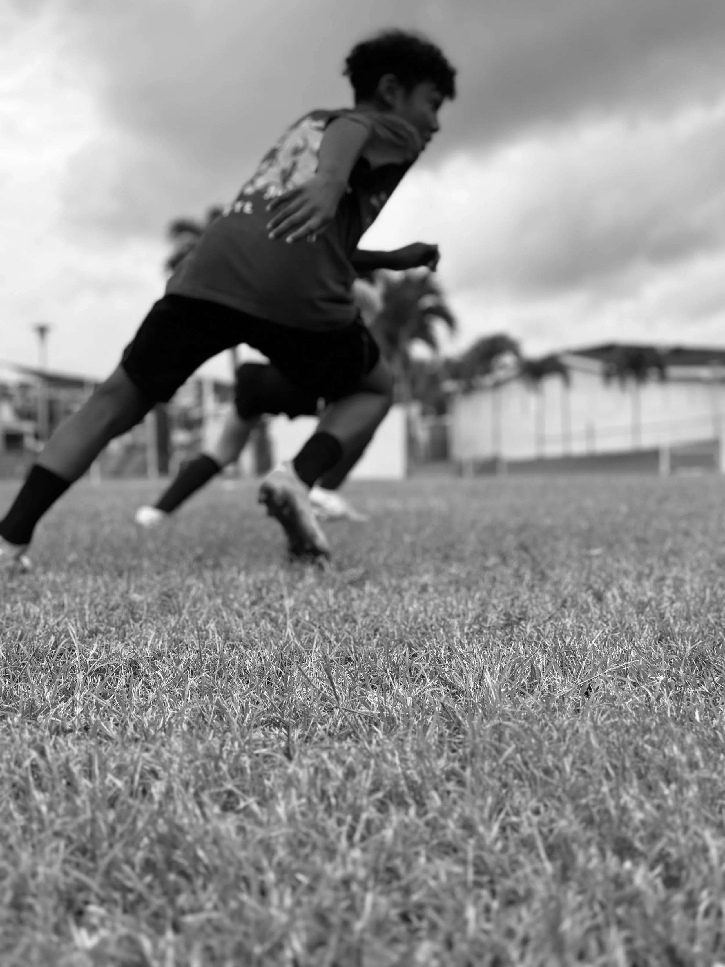 Soccer players warming up on field for training