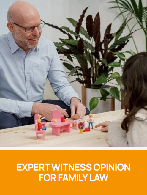A male psychologist or therapist with glasses playing with child using Playmobil figures and miniature furniture at a table, with large indoor plants in the background. Child therapy or psychology assessment or treatment appointment.