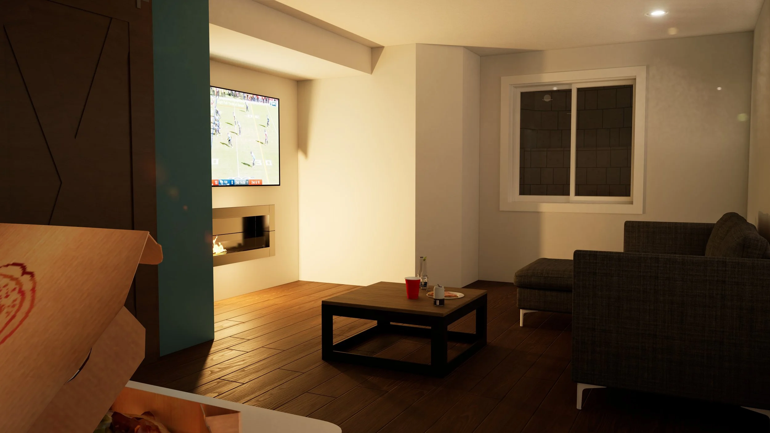 Living room with a wall-mounted flat-screen TV showing a sports game, a modern fireplace below the TV, a window on the right wall, a gray sectional sofa, a wooden coffee table with drinks and snacks, and wooden flooring.