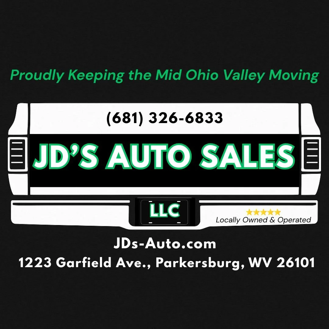 A business card for JD's Auto Sales featuring a black background with white and green text, including a phone number, website, address, and slogan, with a graphic of a vehicle's rear view.