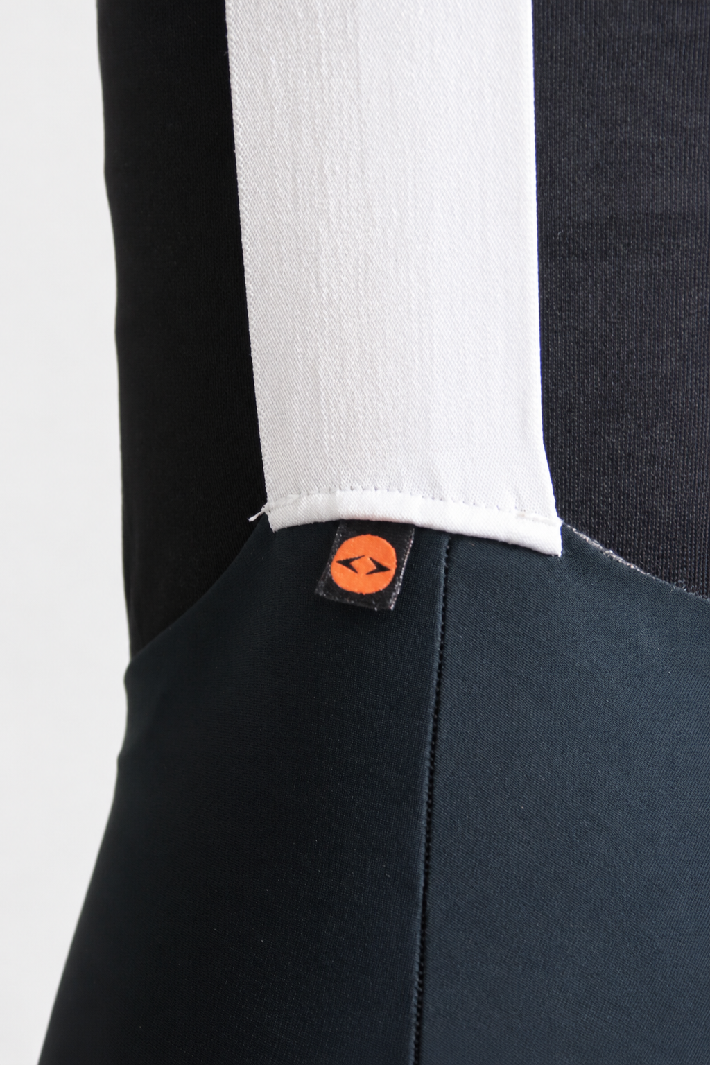 Athletic Garment Seam with Orange Tag.png