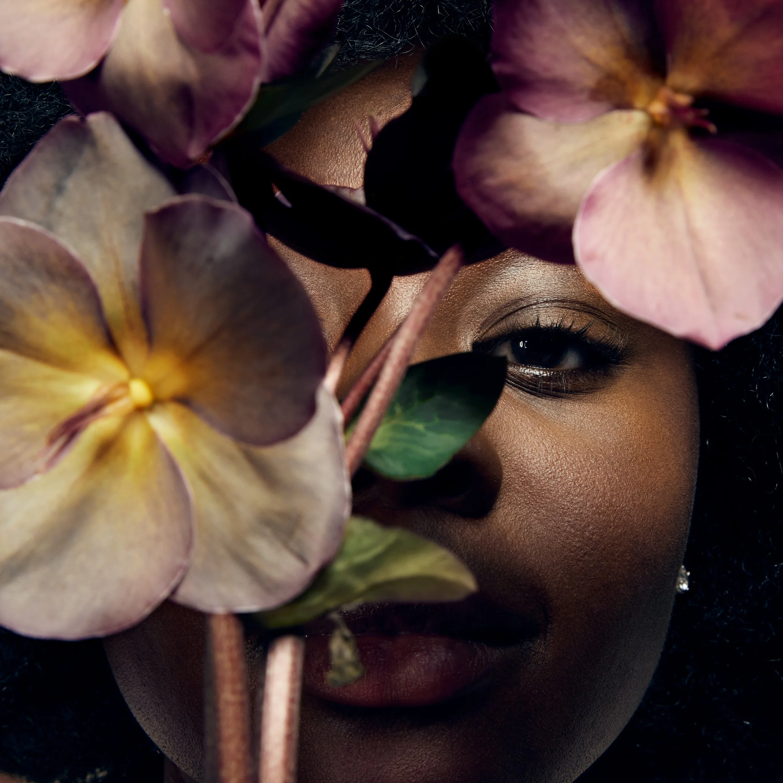 Editorial beauty photography featuring model and florals for James Read Self Glow