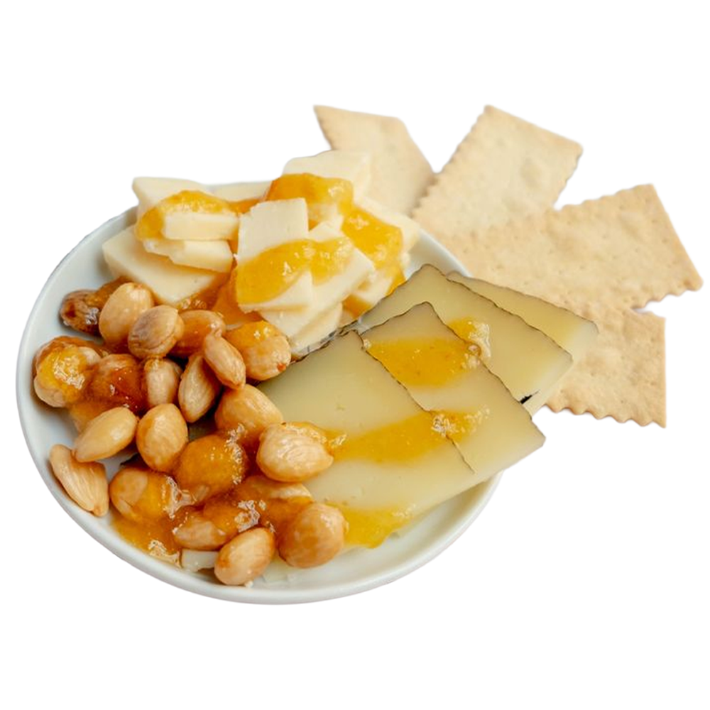 Cheese, chickpeas, and crackers on a plate