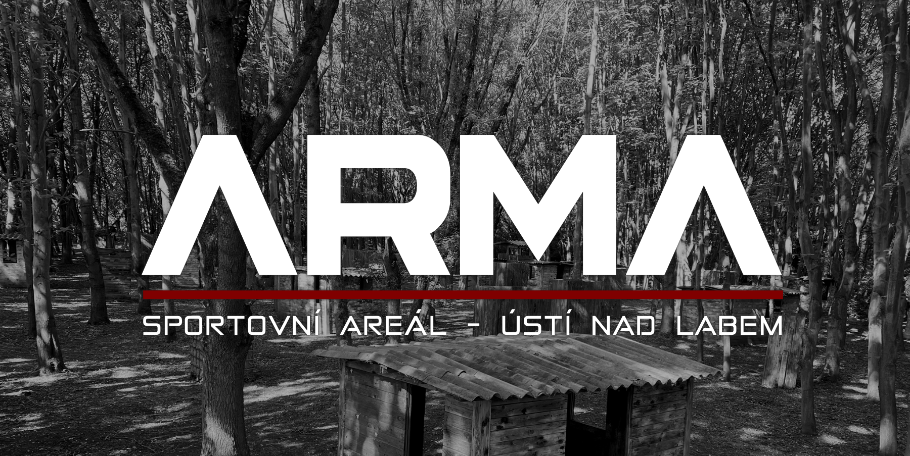 Black and white photo of a forested area with trees and wooden structures, overlaid with white text that reads 'ARMÁ' and smaller text below that reads 'SPORTOVNÍ AREÁL - ÚSTÍ NAD LABEM'
