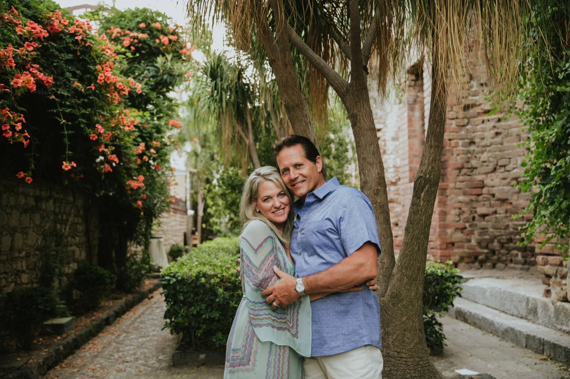 Heather and Ray Haiduk embracing outdoors, reflecting partnership, faith-rooted living, and a shared commitment to wellness.