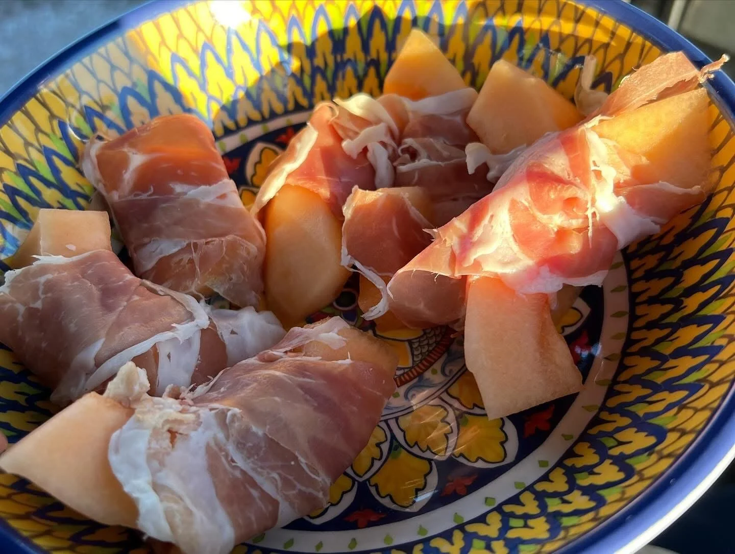 Prosciutto-wrapped cantaloupe with basil, a simple no-cook summer appetizer
