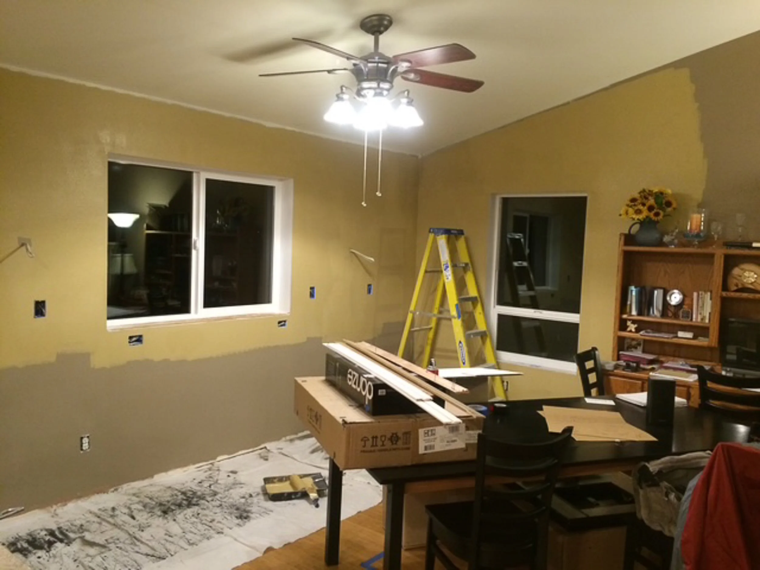 The original dining and family room area prior to the kitchen relocation. A foundational view of the spatial reimagining for this Kitsap County home transformation.