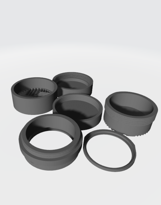 A collection of grinder parts, used to make the Grinder Budee mini