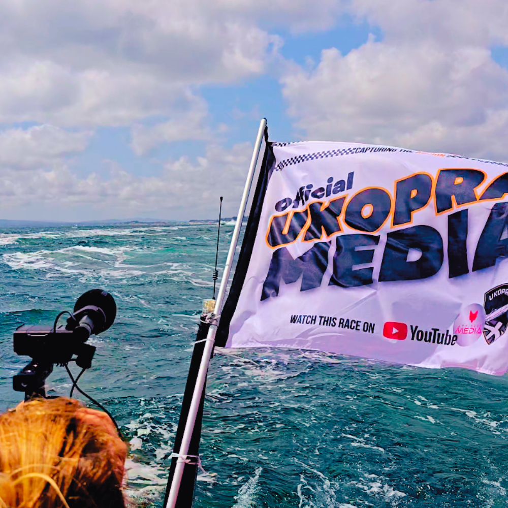 terri filming with an official media a ukopra flag attitude media filming uk offshore powerboat racing