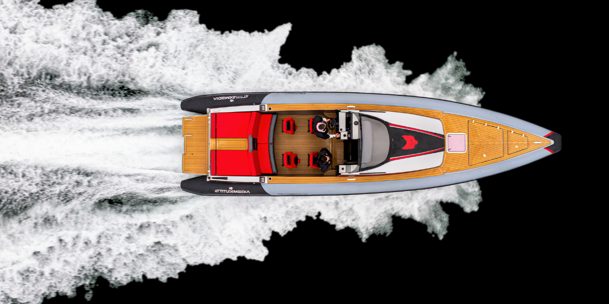 drone shot of the Technohull Attitude 35 with black sea and white wash