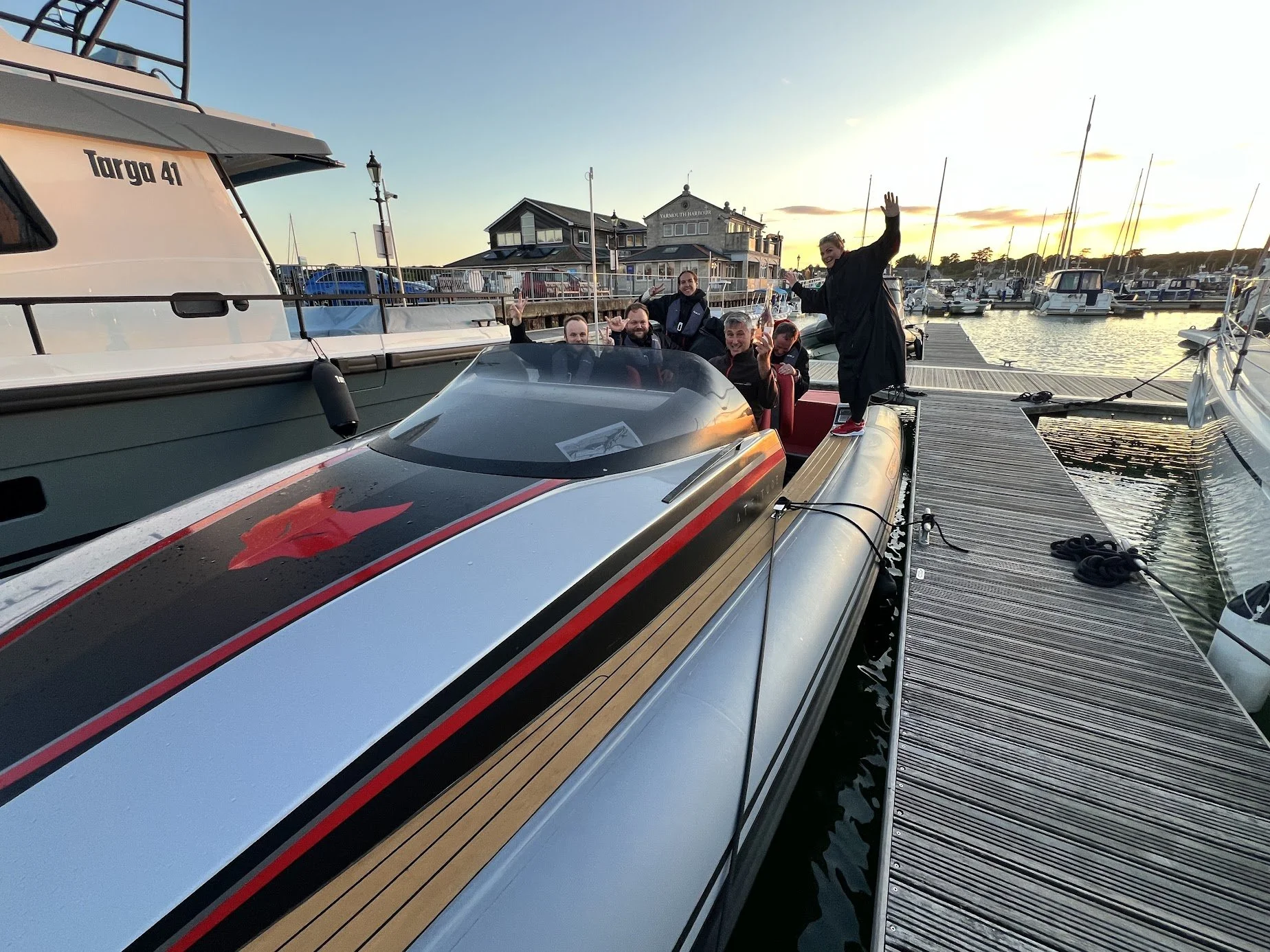 guests enjoying themselves aboard attitude charter in yarmouth harbour sohwing technohull luxury powerboat