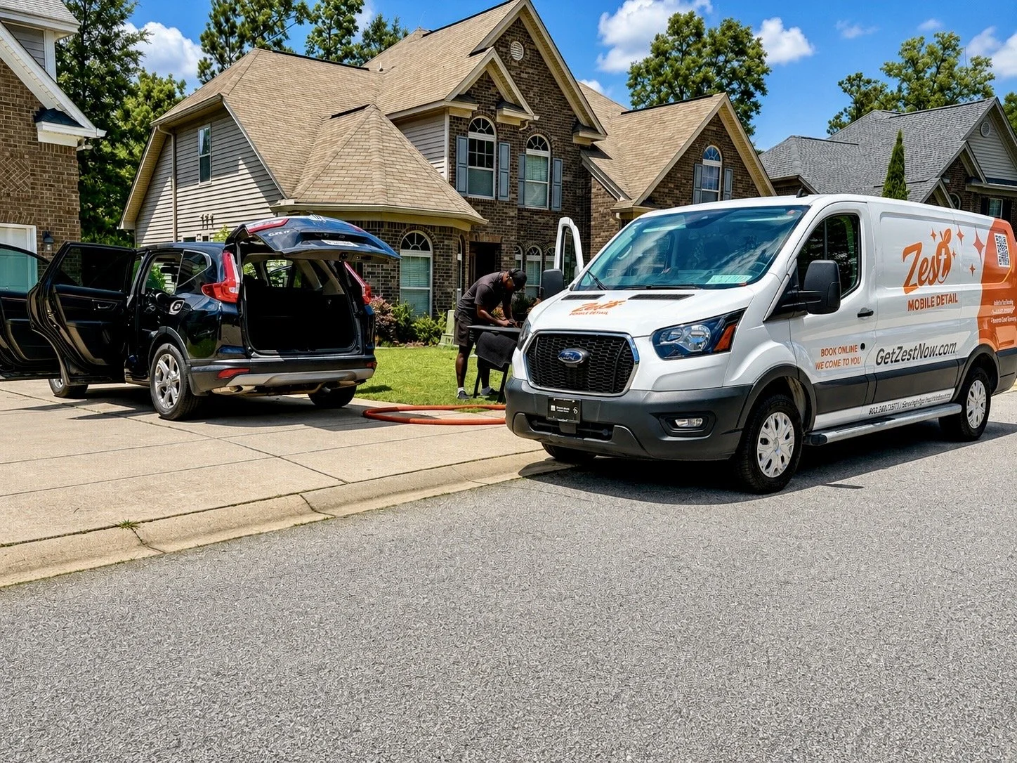 Top Rated Zest Mobile Detail service van beside a freshly detailed Honda CR-V in Irmo, SC.