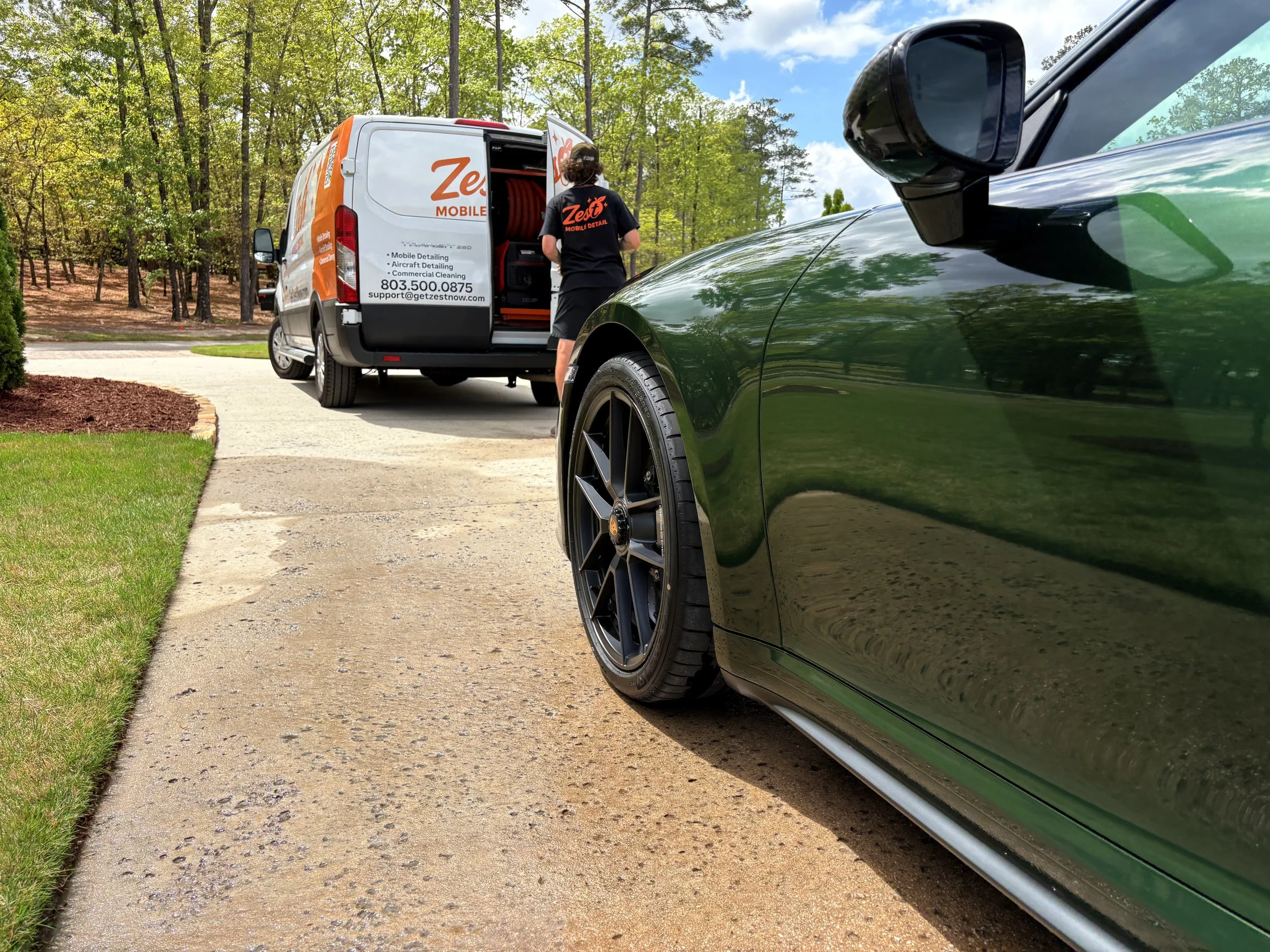 A Zest Mobile Detail technician arriving on-site to provide professional mobile detailing services for a luxury vehicle in Columbia, SC. Our fully equipped mobile detailing vans bring premium interior detailing, exterior detailing, paint polishing, c