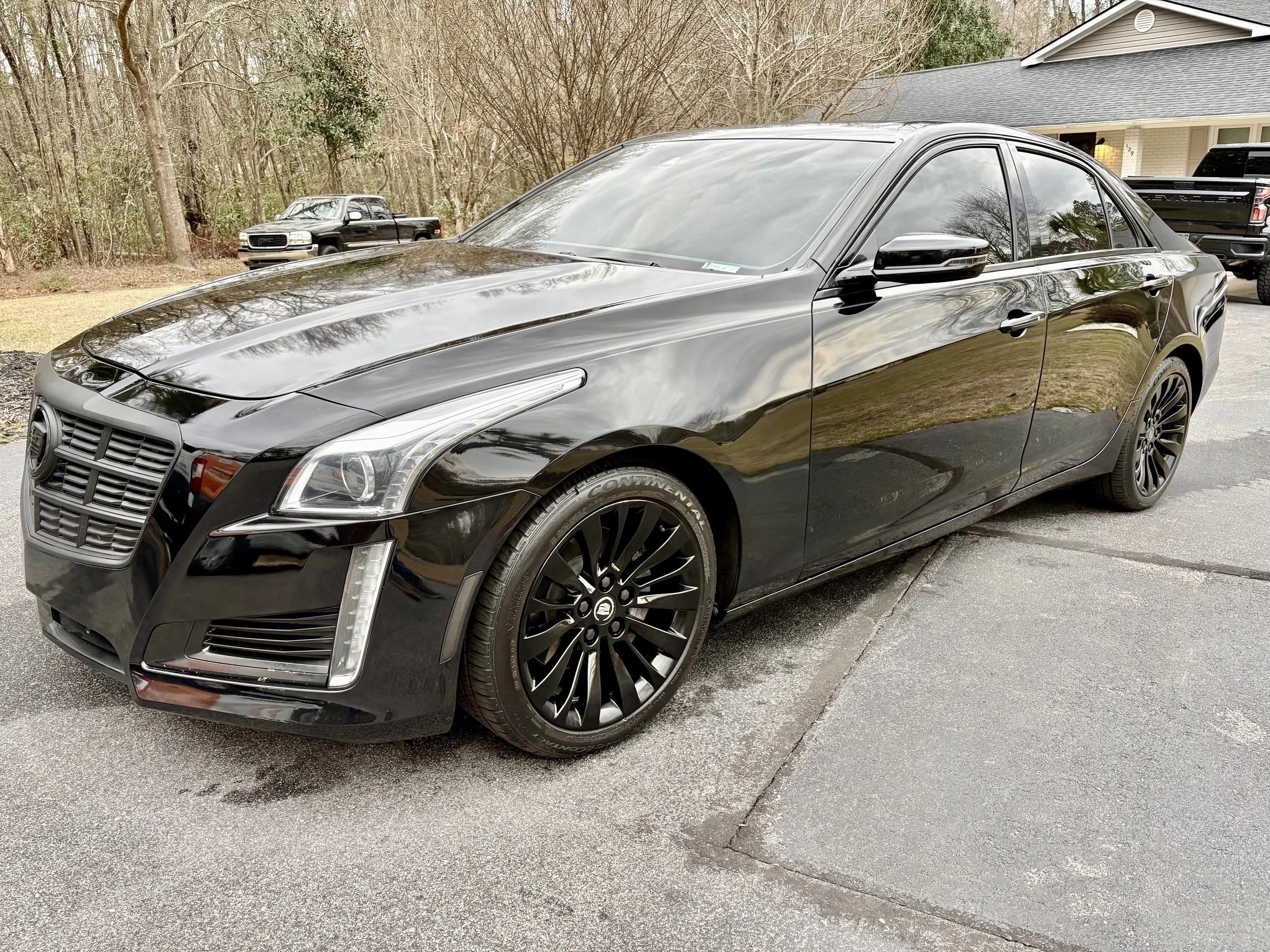 Black Cadillac CTS full paint polish in West Columbia SC – professional car detailing and exterior restoration by Zest Mobile Detail