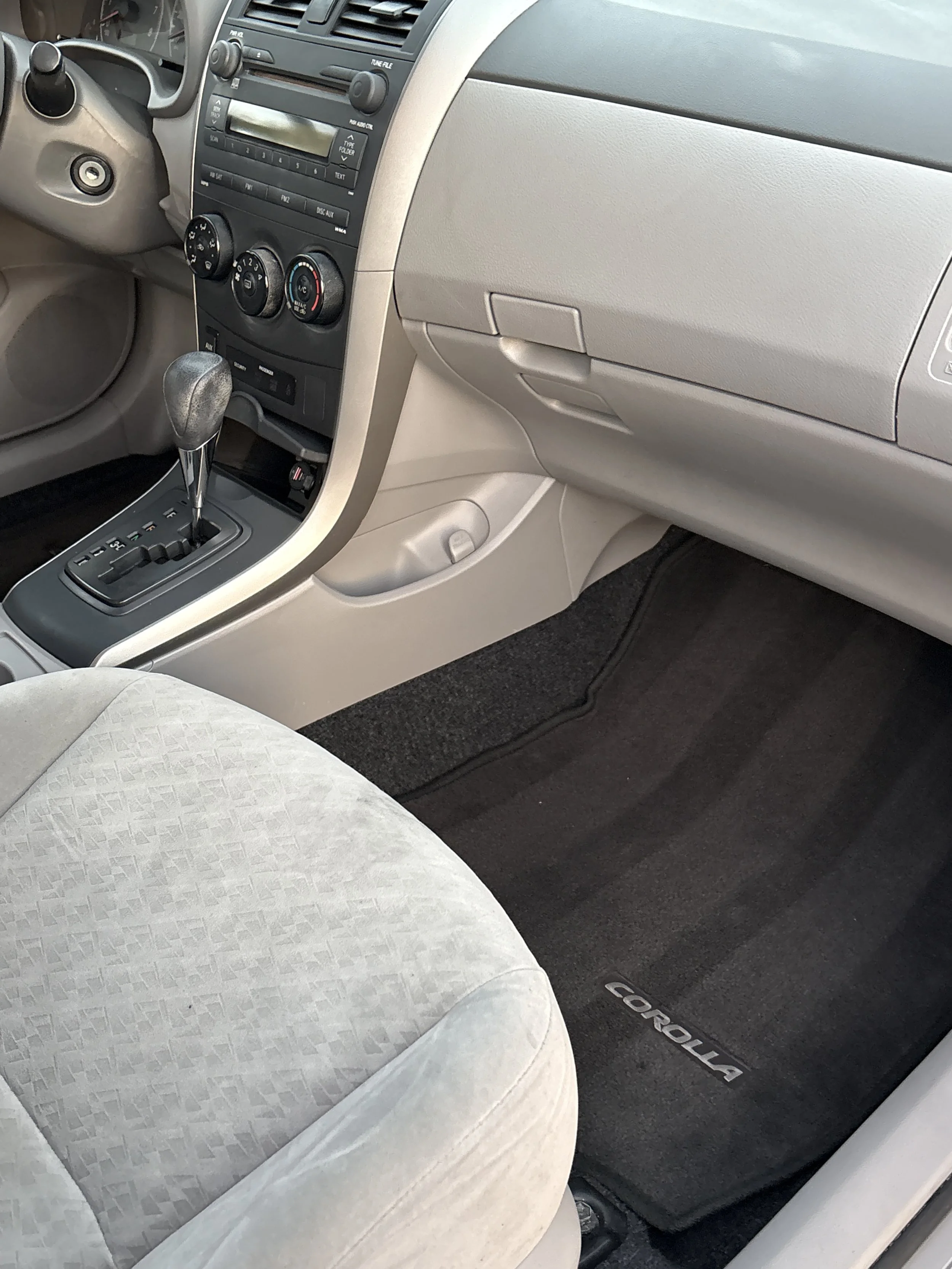 Toyota Corolla interior professionally cleaned by Zest Mobile Detailing with front seat and console detailed in Lexington South Carolina