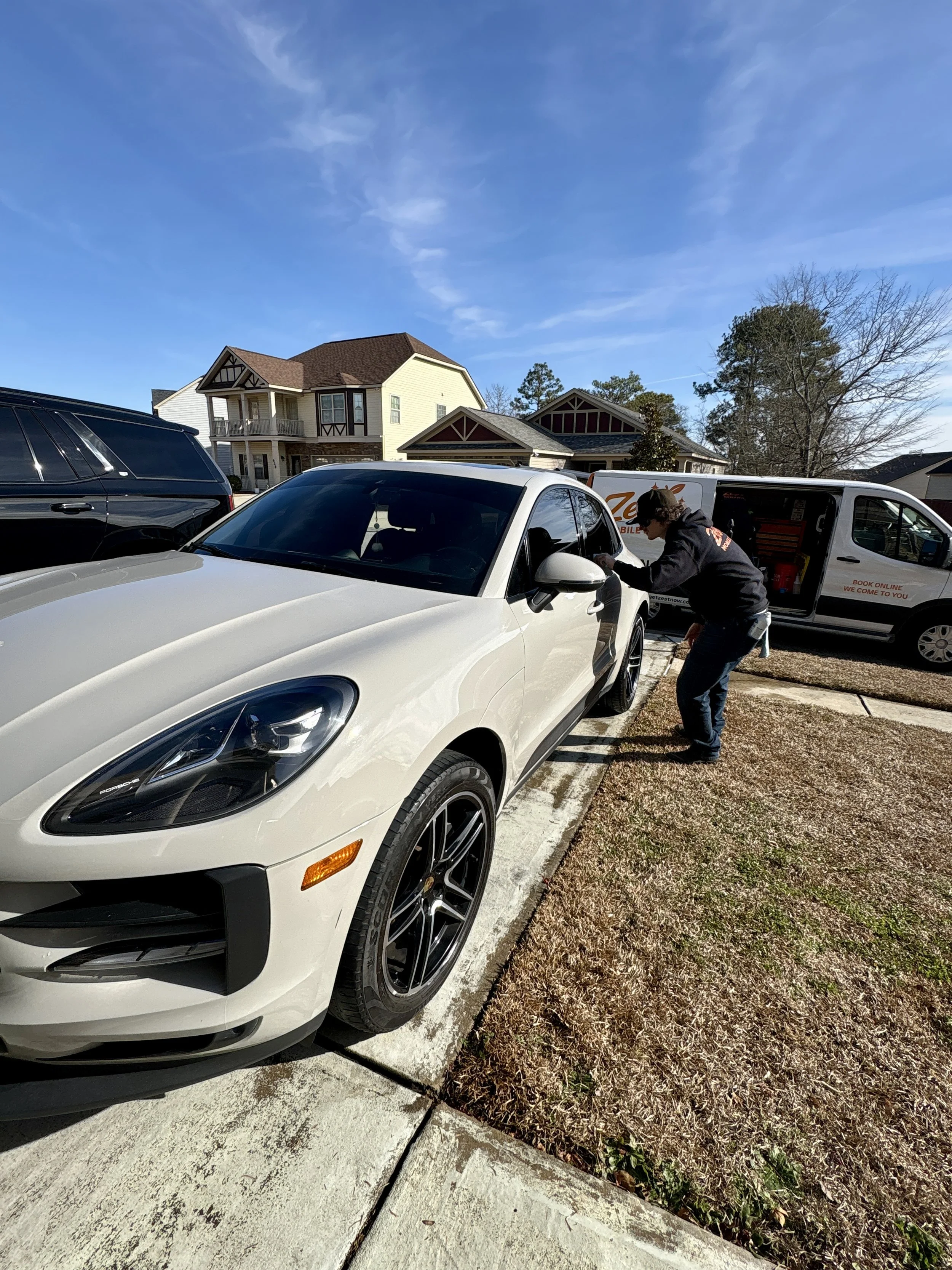 Porsche after a full detail, paint polish, and wax service by Zest Mobile Detail & Cleaning in Forest Acres, SC featuring deep gloss enhancement, luxury car detailing, paint protection, swirl reduction, and premium mobile detailing services near