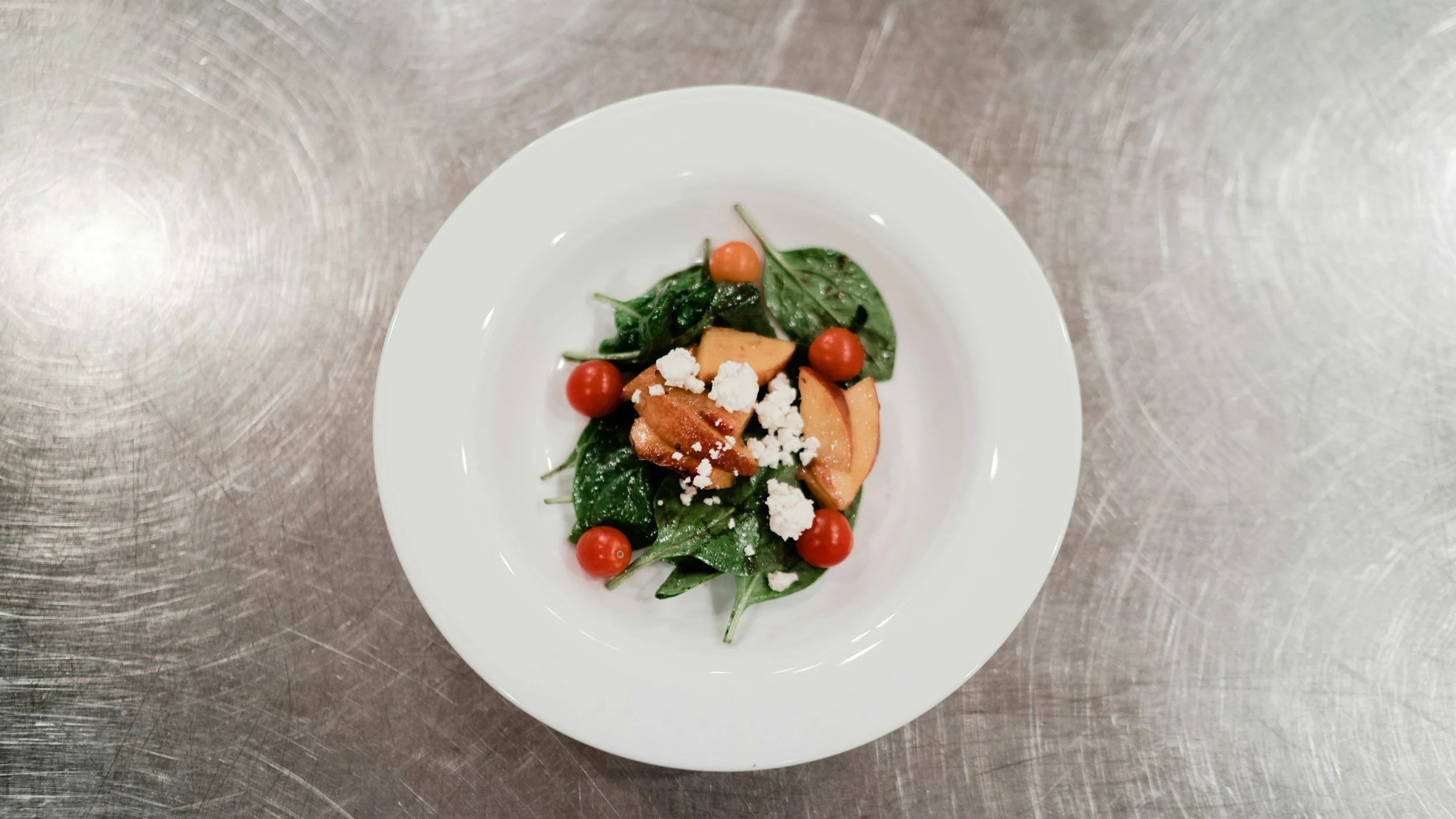 Plated wedding dinner service at Denham Hospitality