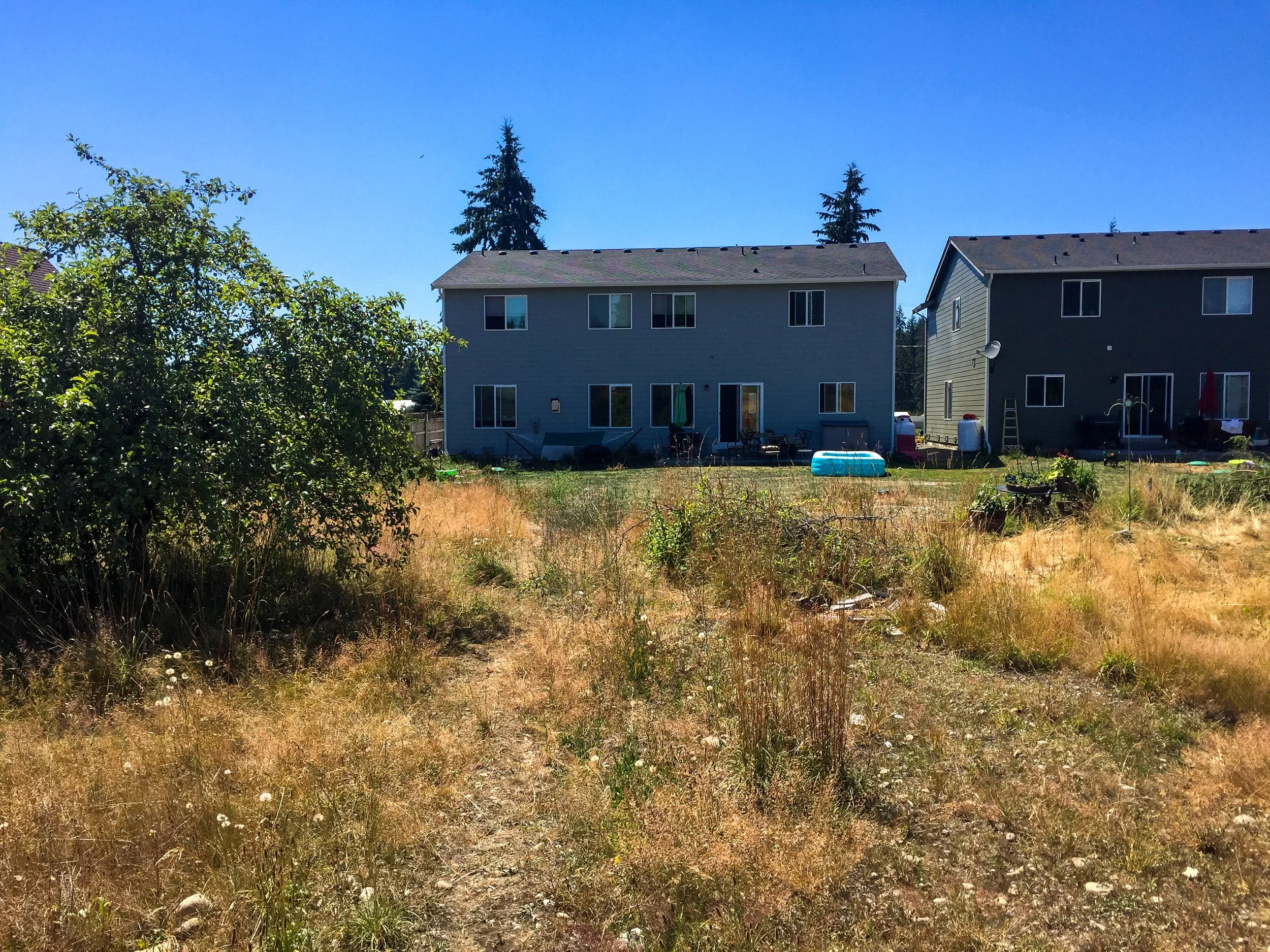 A landscaping project I had the joy of doing. Rock retaining walls, terraced garden beds, in-ground sprinkler system, fire pit with flagstone seating pad, flagstone pad for above ground pool, hydroseed, turf grass. 