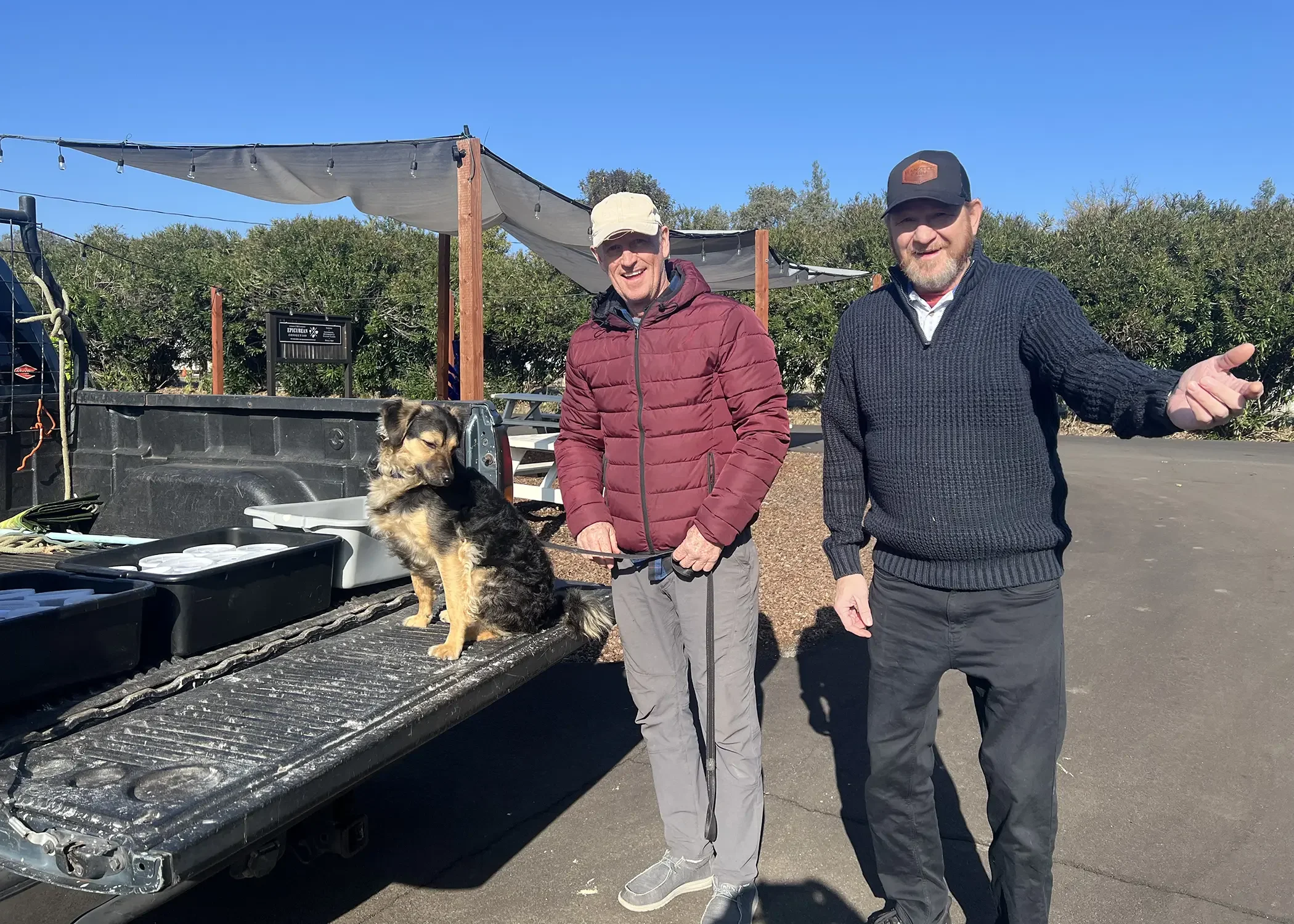 Ben Sessions with neighbor Bob and his dog outside of The Epicurean Connection in Sonoma