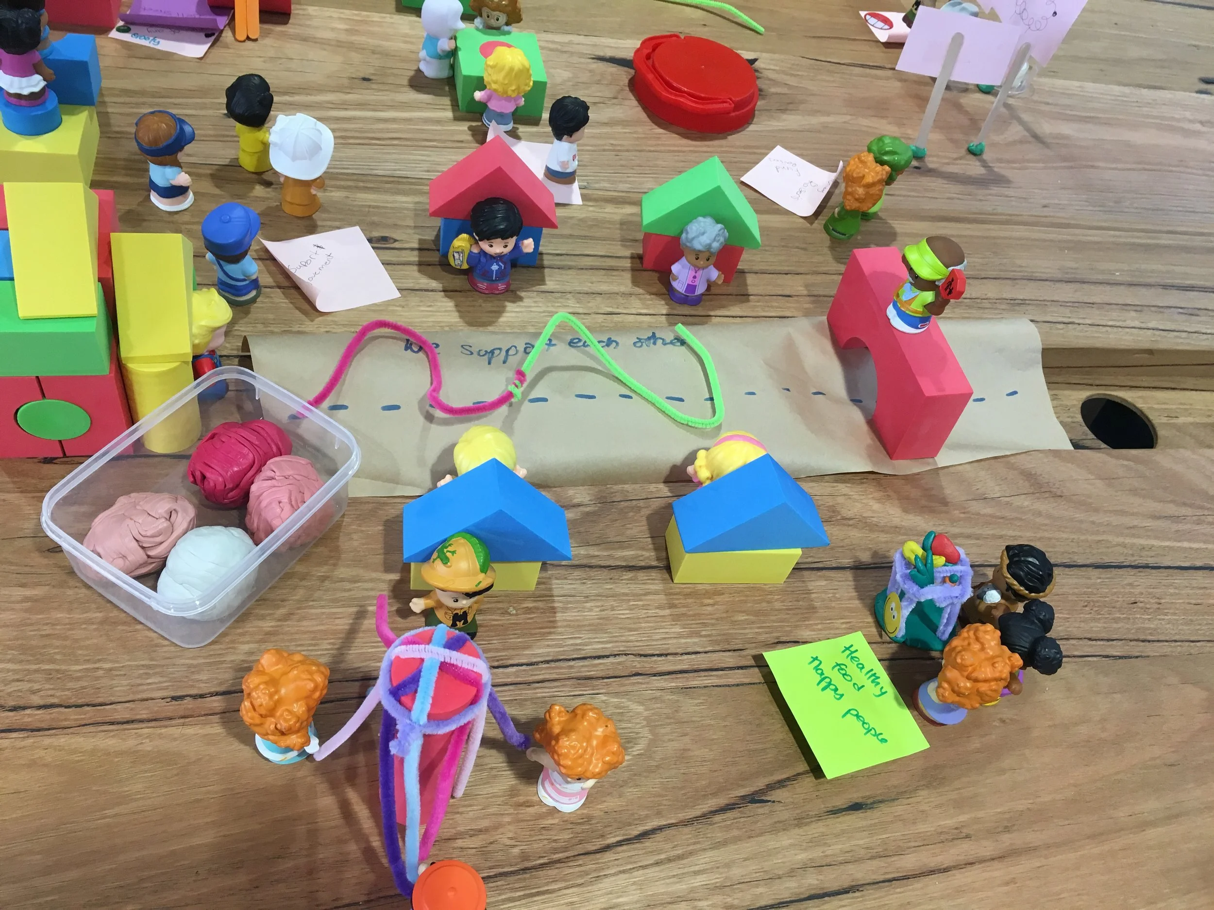 A representation of a supportive community, created with craft materials