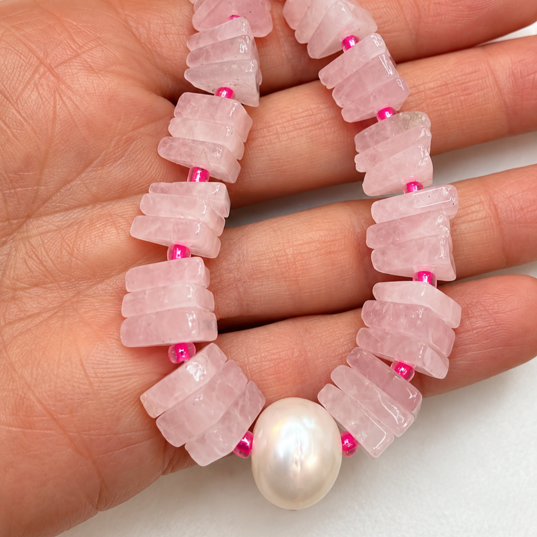 Rose+Quartz+Necklace+in+Hand.png