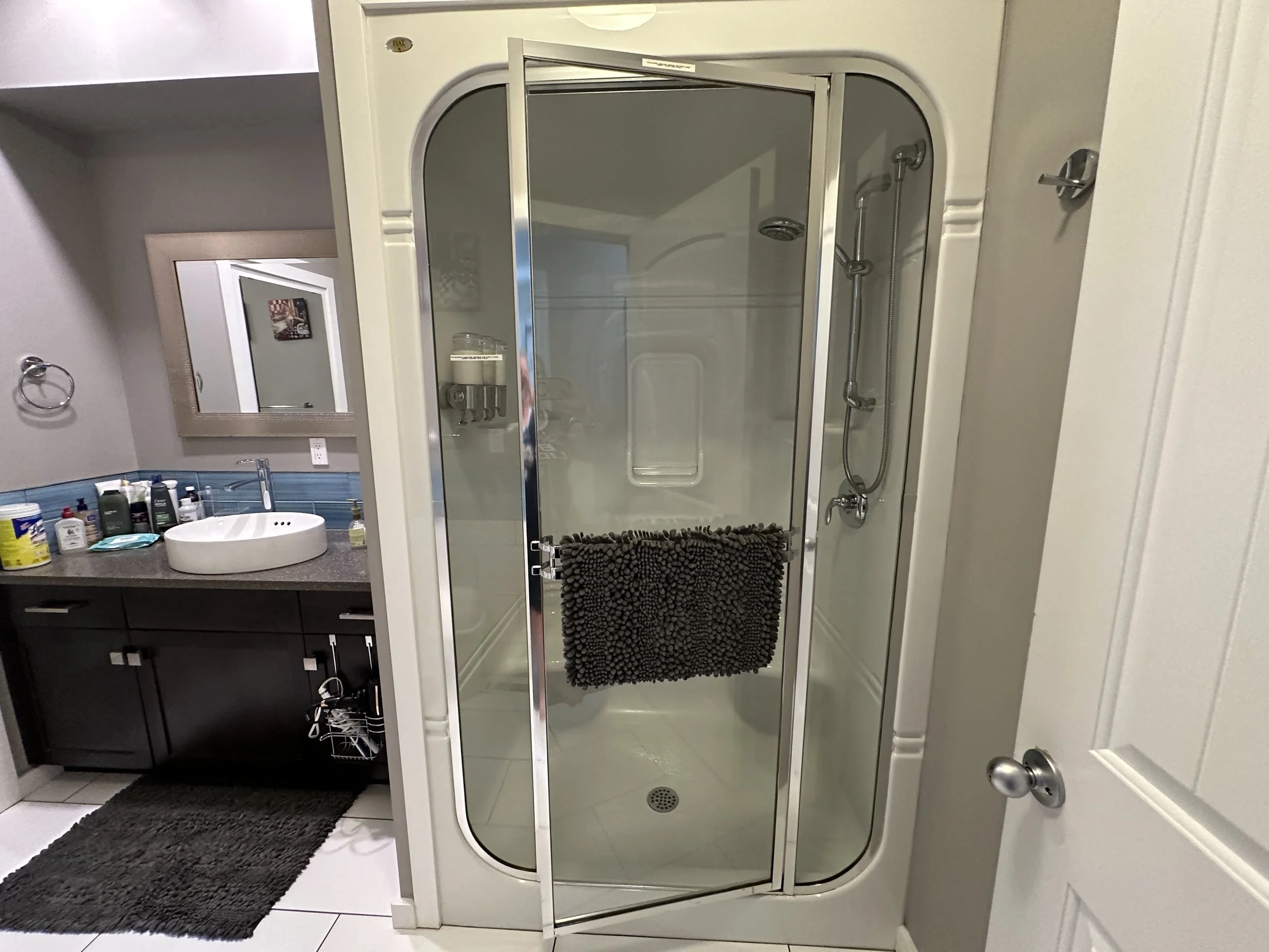 Shower located down the hall.