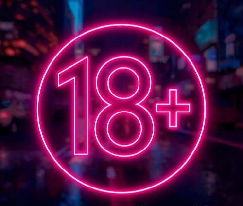 Neon pink 18+ sign in an urban street at night.