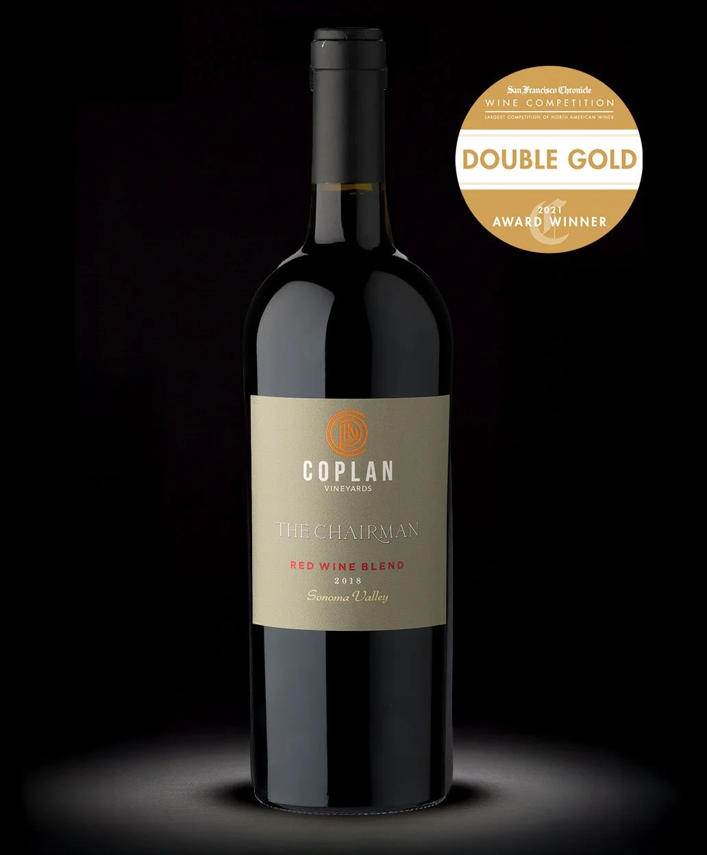 A bottle of Coplan Vineyards The Chairman Red Wine Blend from Sonoma Valley, vintage 2018, with a gold award sticker for Double Gold at the 2021 San Francisco Chronicle Wine Competition.