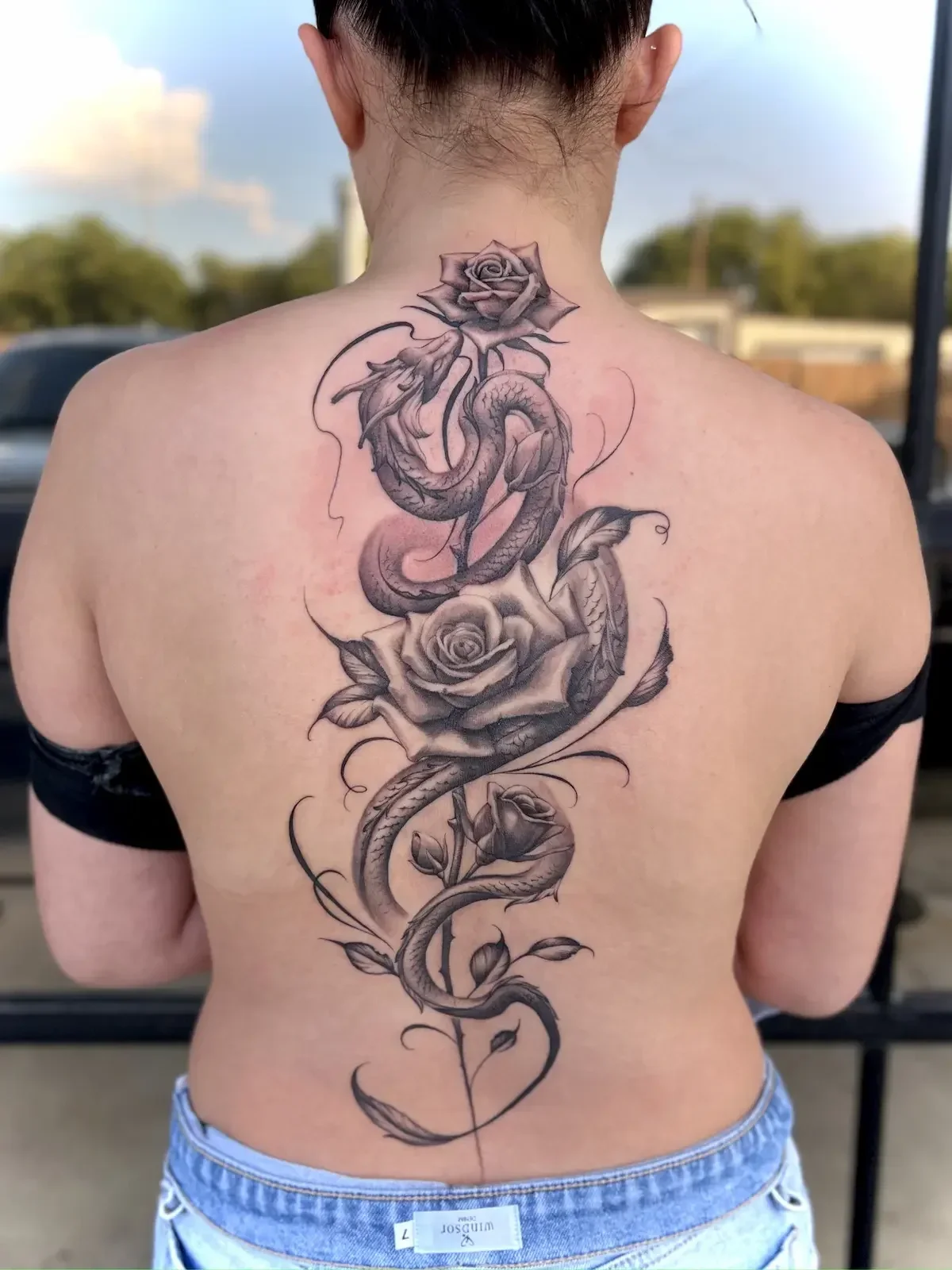 Black and grey snake and roses back piece tattoo by Austin tattoo artist Johny Vasquez - Mommasboy Tattoo