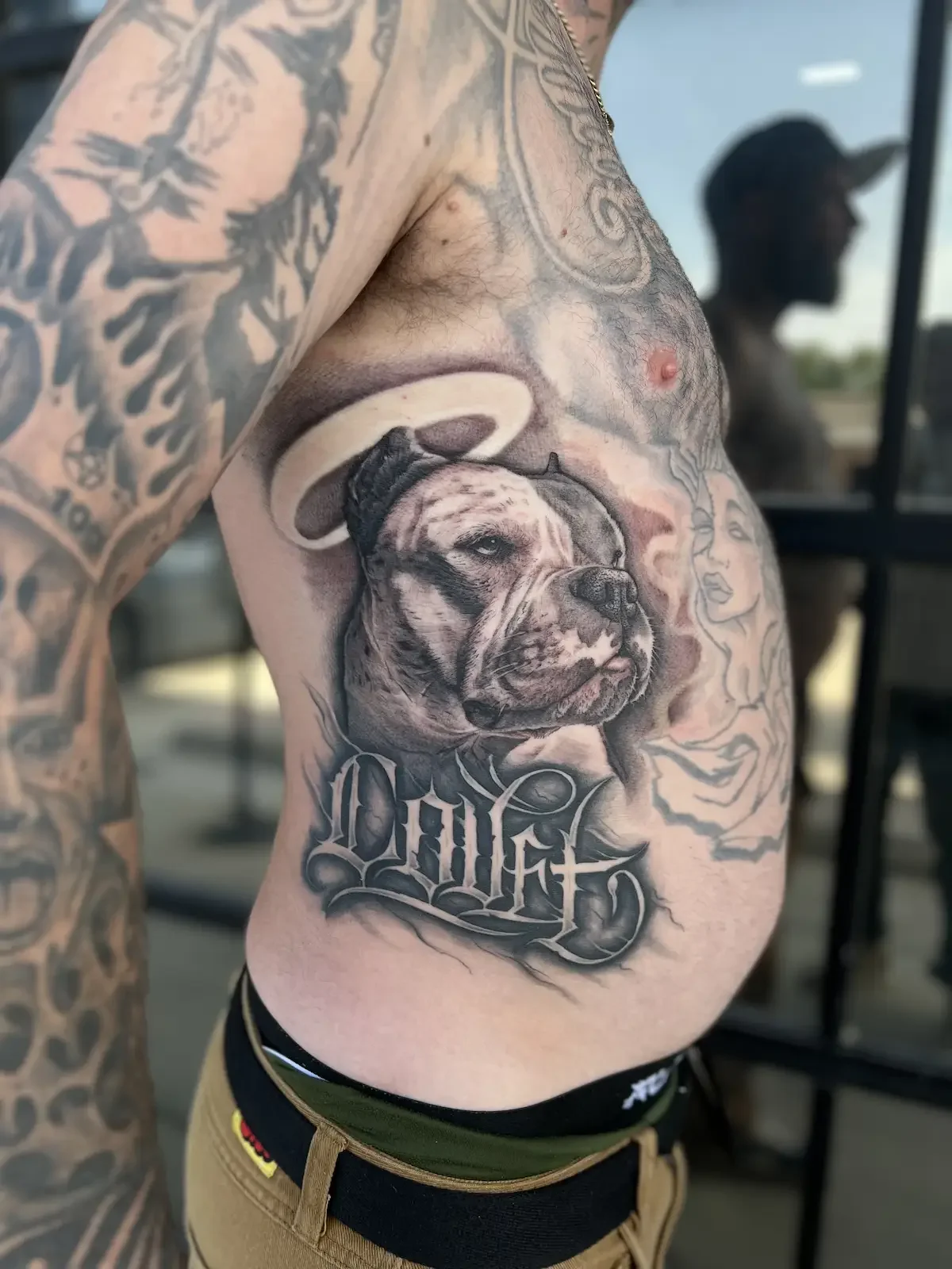 Black and grey realism dog portrait tattoo with halo and custom lettering by Johny Vasquez - Mommasboy Tattoo Austin TX