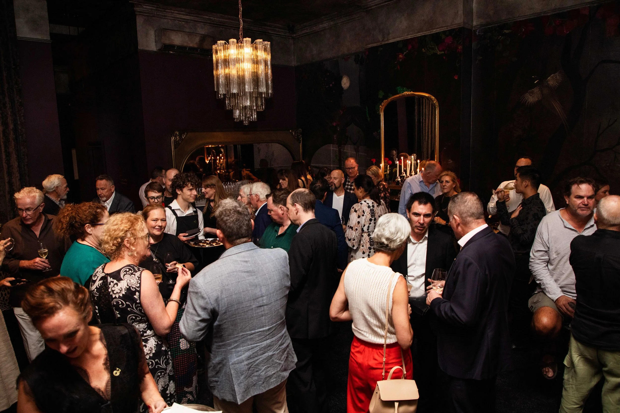 A crowded private event in Smith St Bistrot's private dining space, La Vie en Rose