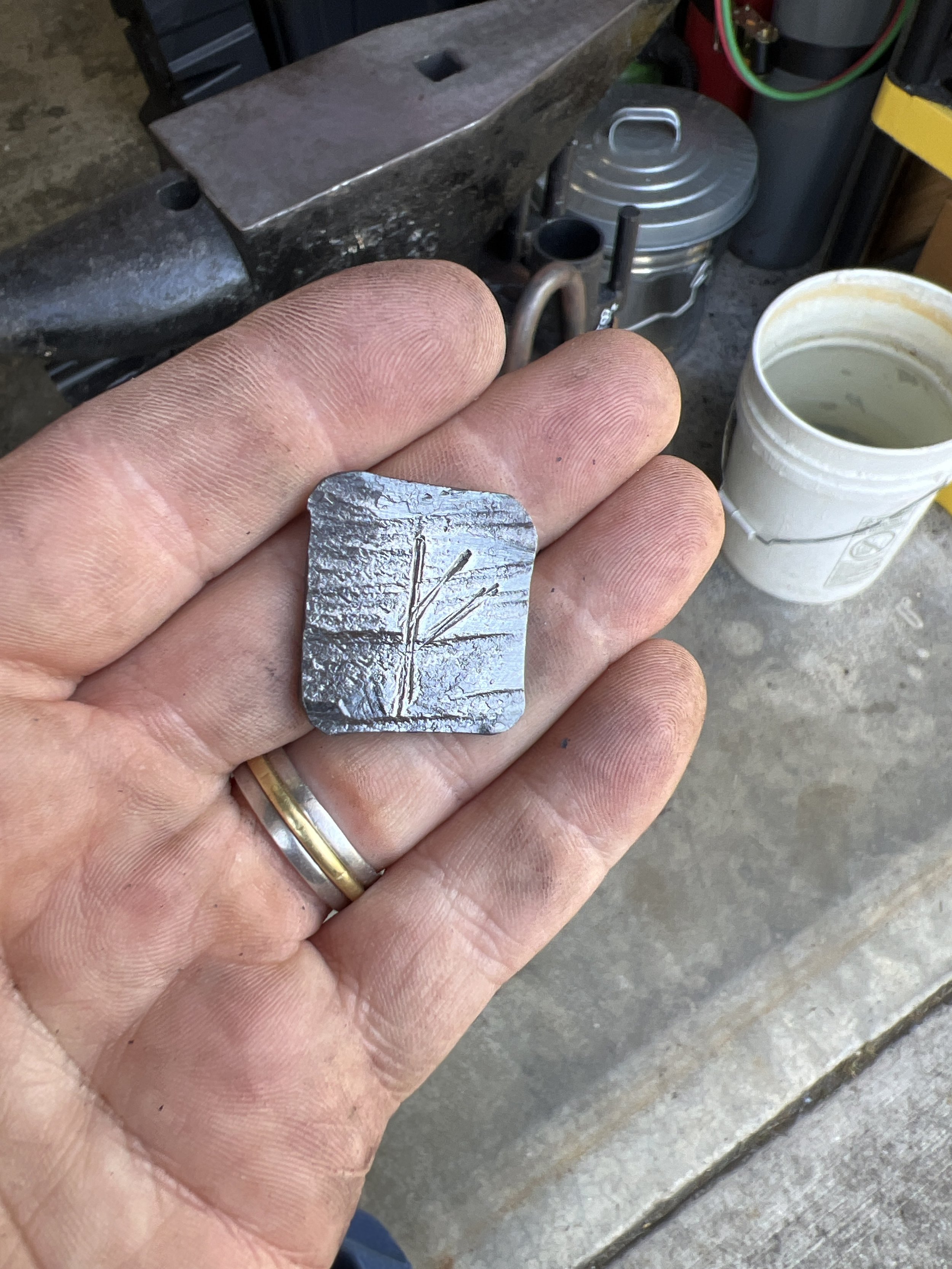 Pocket chip with rune.