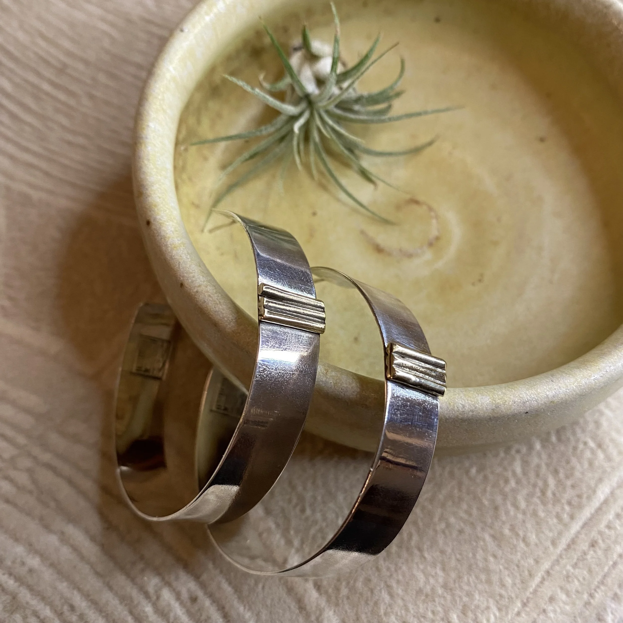 Large sterling weightless hoops with brass accent and sterling posts