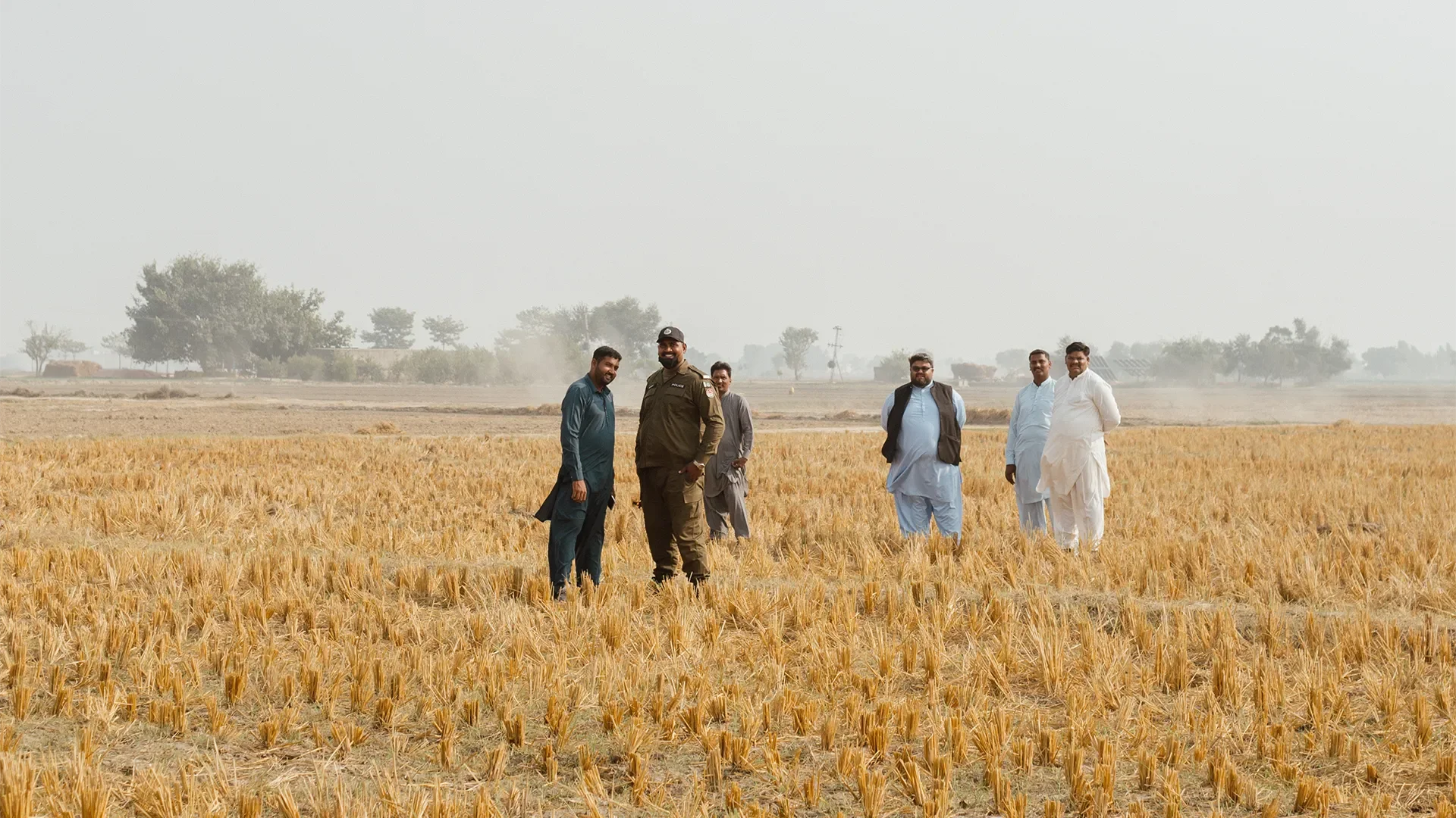 People standing in an open field