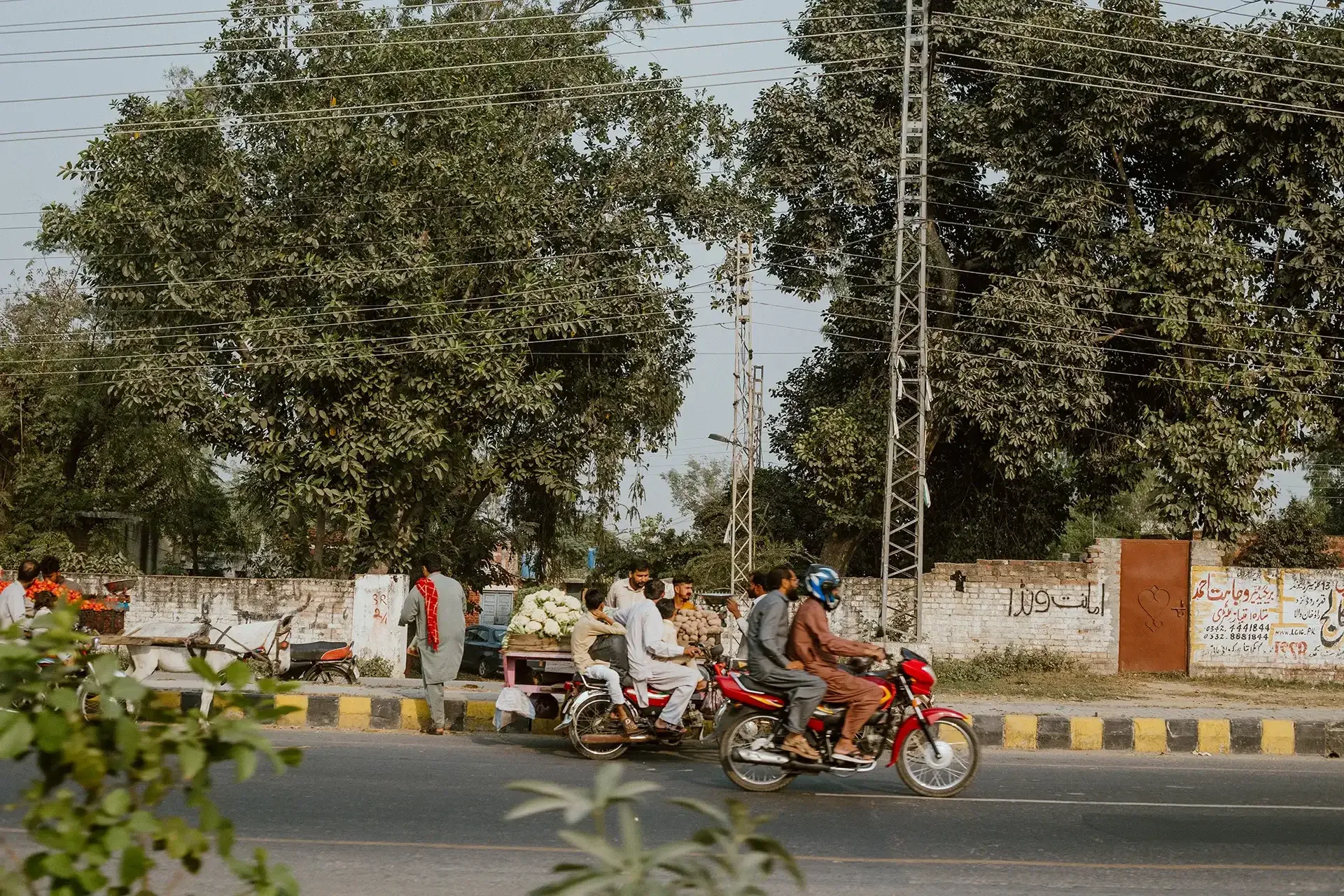 Men on motorcycles in South East Asia