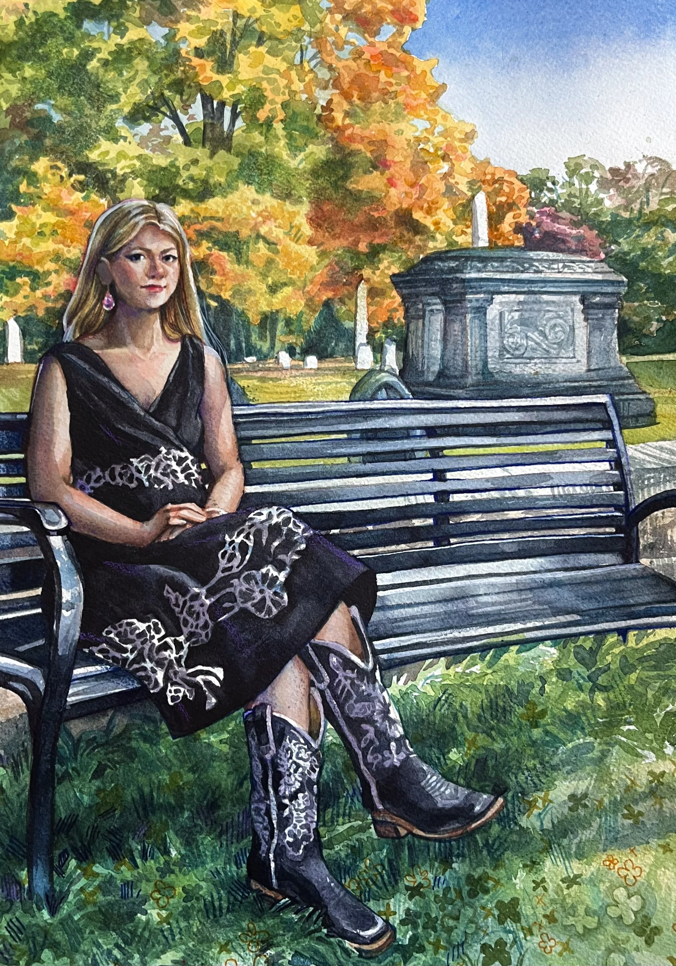 Watercolor painting of a woman sitting on a park bench with autumn trees and a monument in the background. She is wearing a black dress with leopard print accents and cowboy boots.