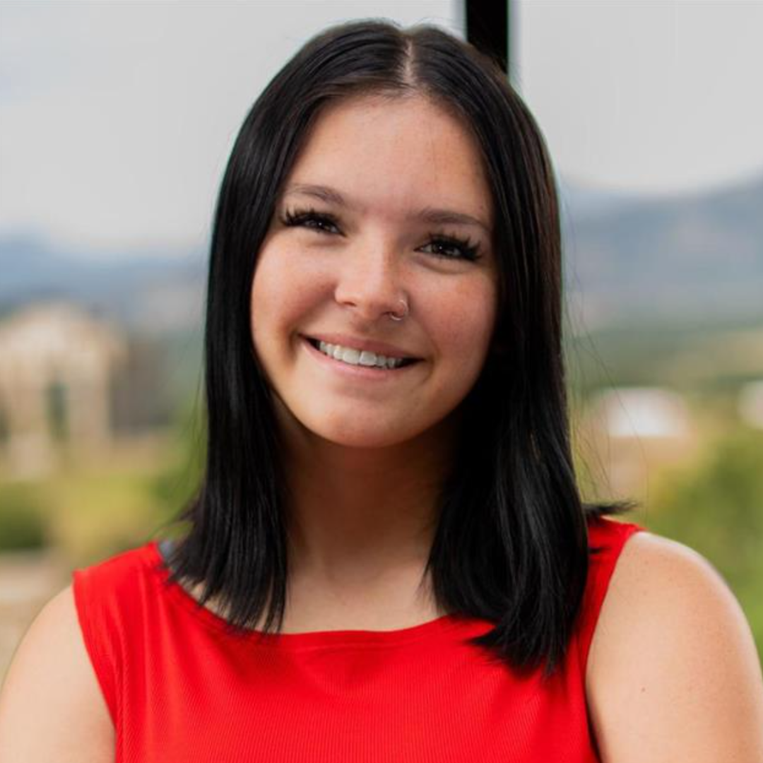 Headshot of Lexi Nunez-Rebel - Real Estate Agent in Colorado Springs Area with Veteran Home Team and ReMax Real Estate Group