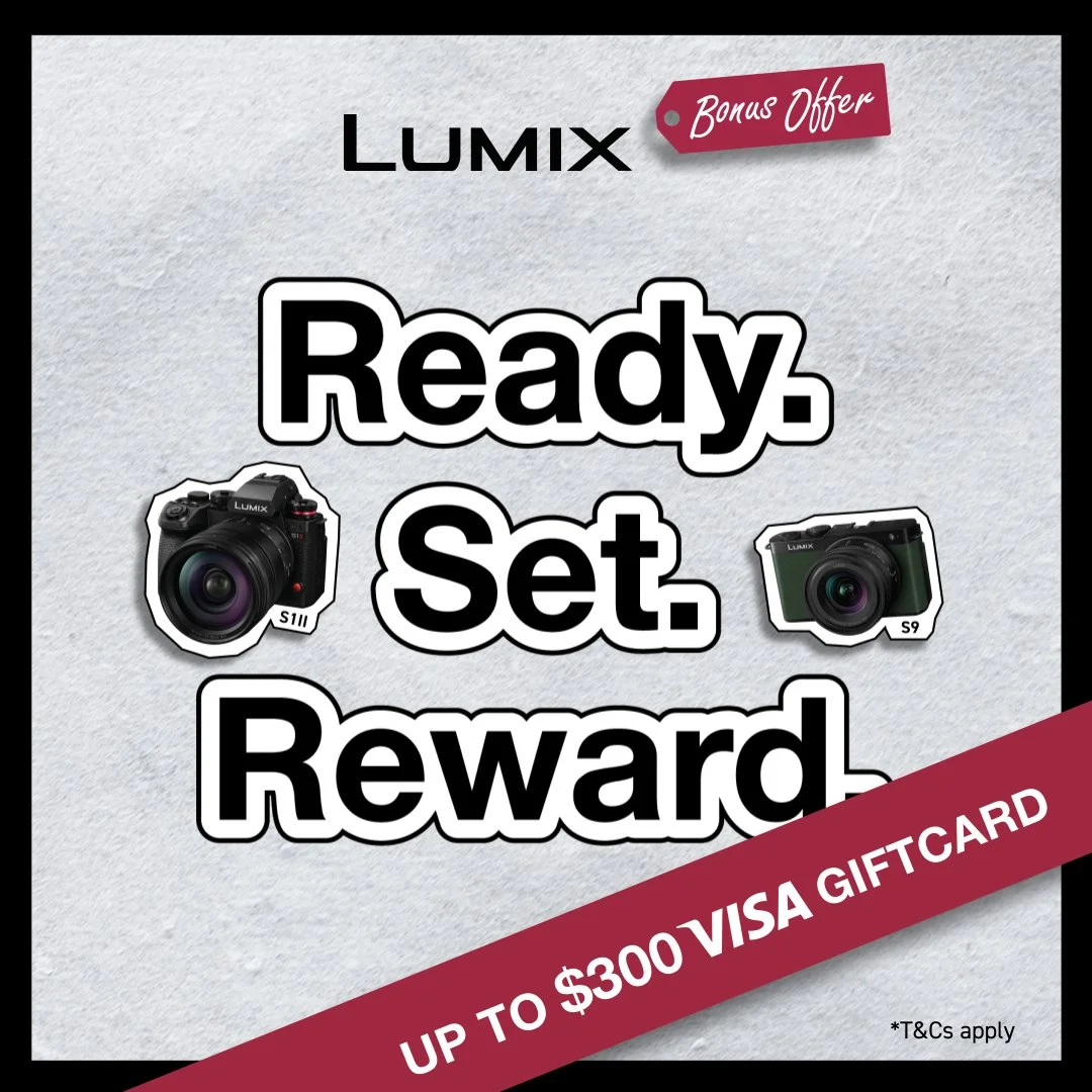 Advertisement for Lumix cameras promoting a bonus offer with up to $300 Visa gift card reward and images of two Lumix cameras.
