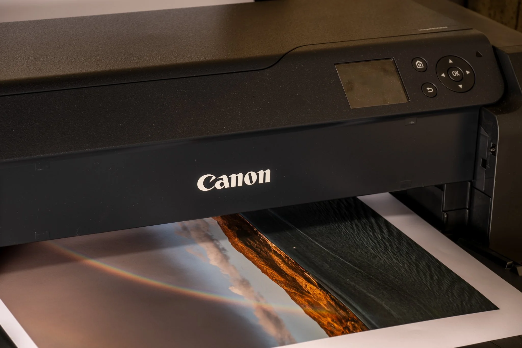 Canon printer printing a photo of a volcanic eruption.
