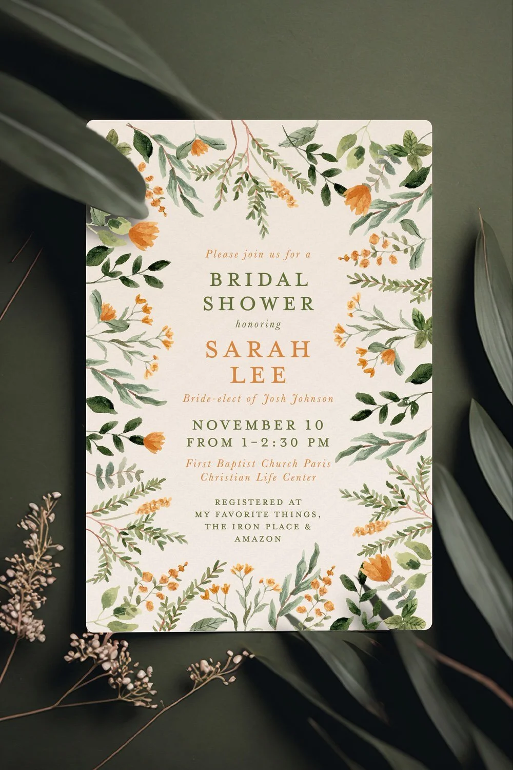 Wedding invitation for Sarah Lee's bridal shower, decorated with green and orange watercolor floral illustrations, announcing details including date, time, location, and registry information.