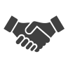 Two hands shaking, symbolizing agreement or partnership.