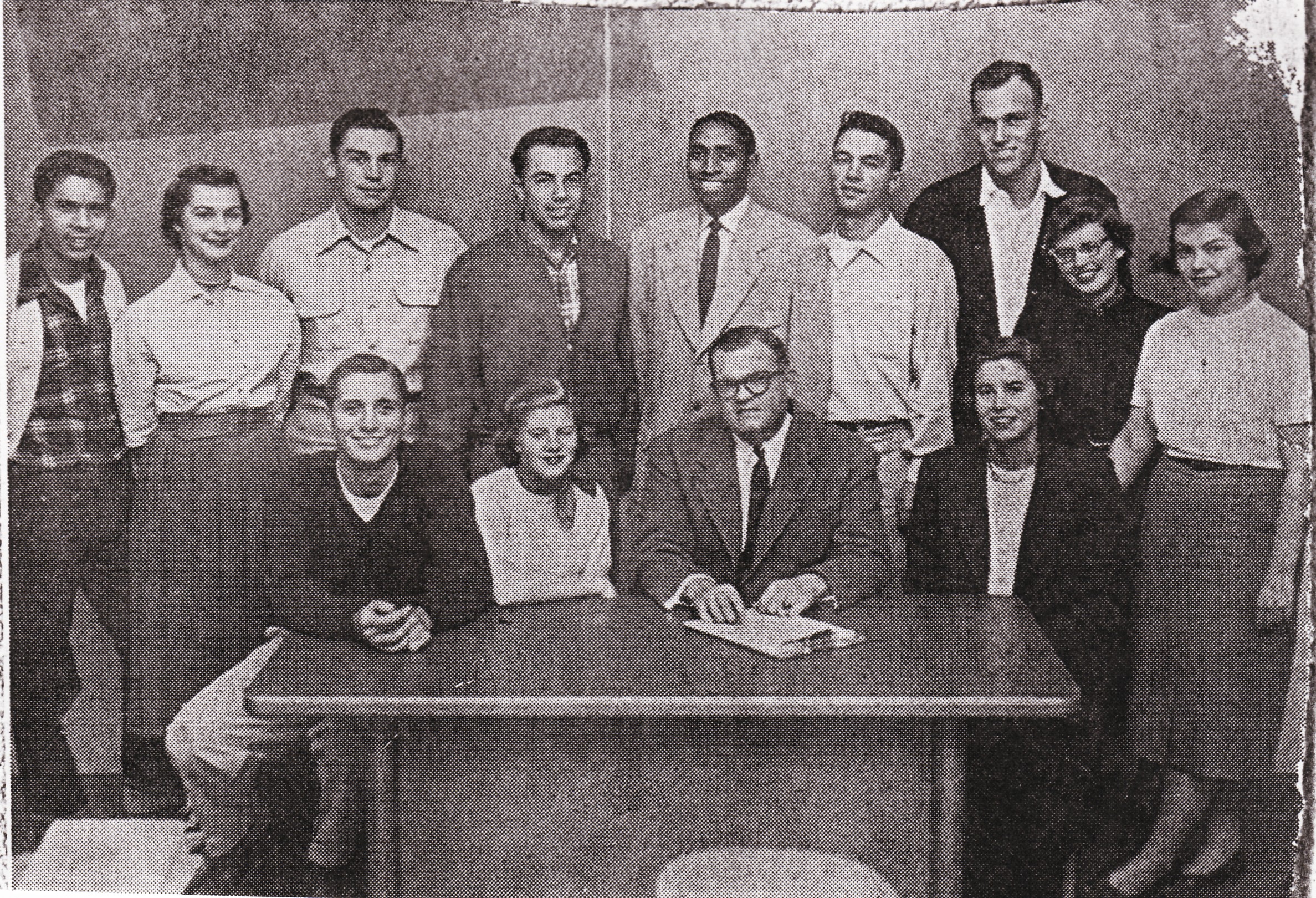 034bob-PIC group in newspaper.jpg