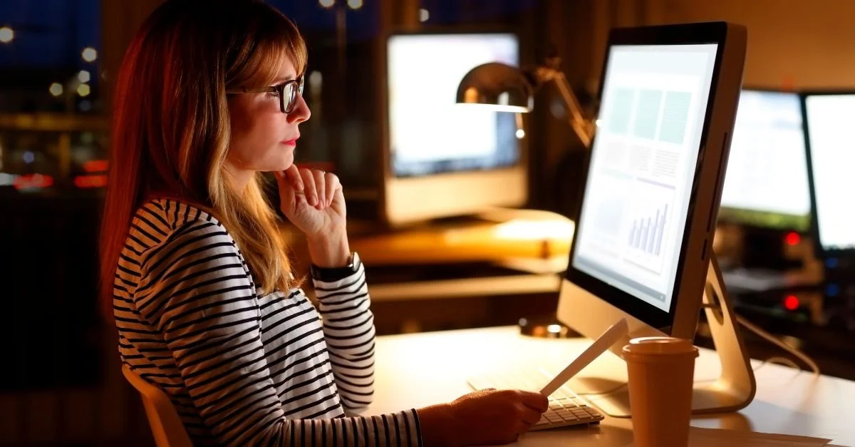Female professional working late at her computer
