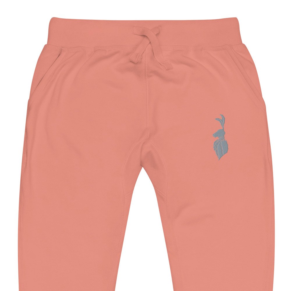 Pink pants with a drawstring waist and a small blue bunny logo on the front right pocket.