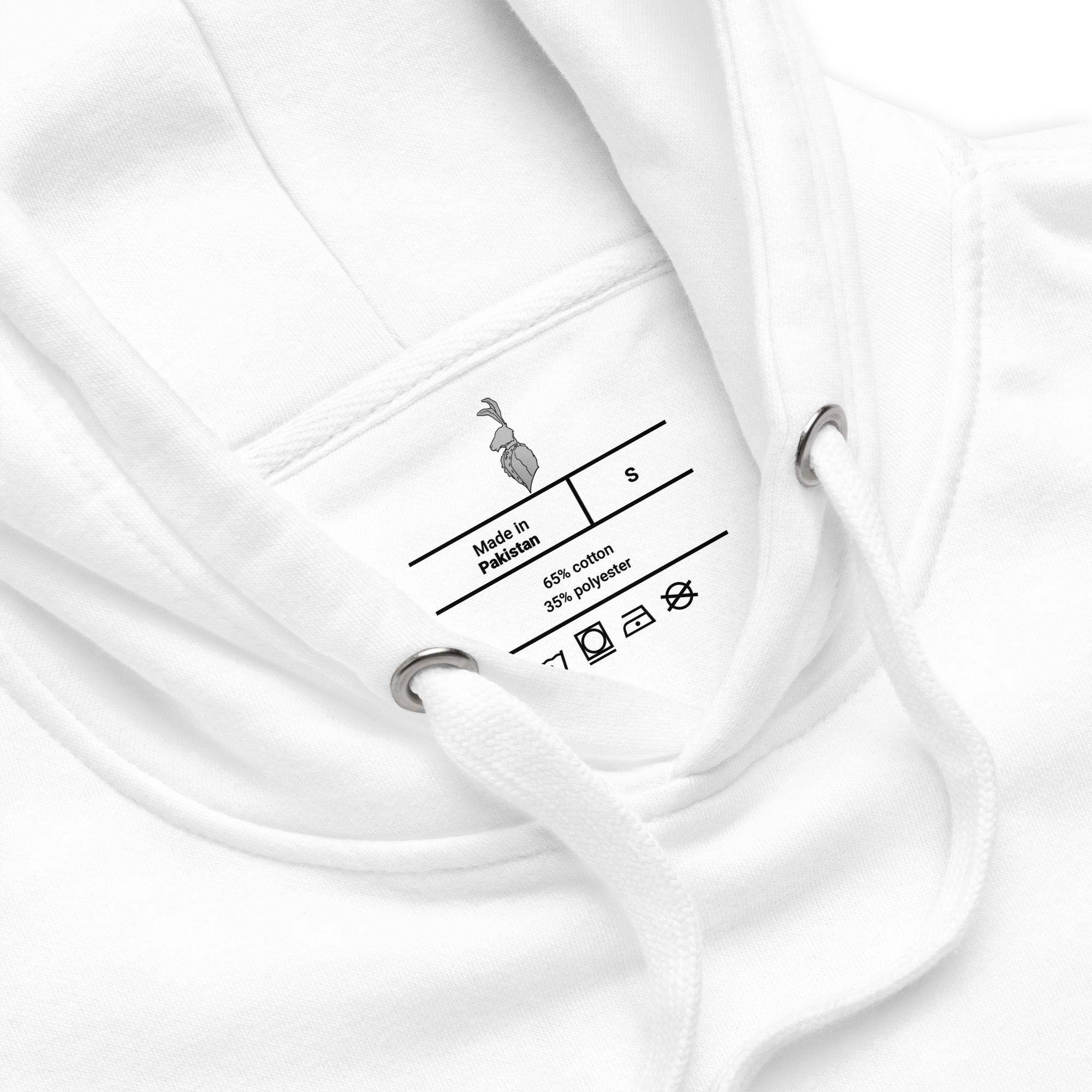 Close-up of the inside collar of a white hoodie showing the clothing label. The label indicates good quality fabric made of 65% cotton and 35% polyester, with care symbols. The brand logo features a small illustration of a hare. The hoodie has metal 