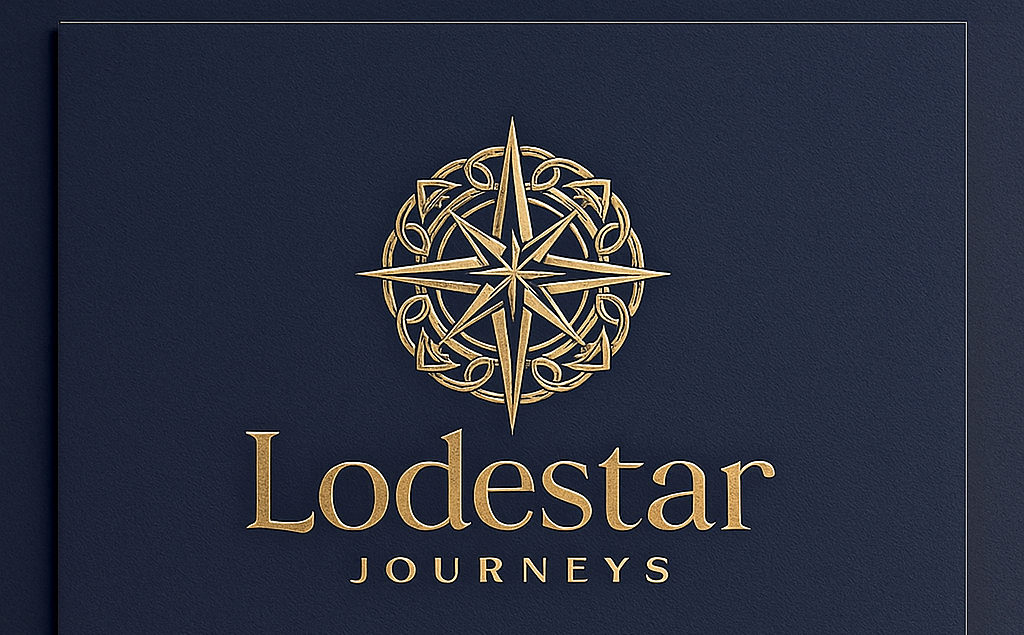 Close-up of a navy blue cover with a gold compass rose and the text 'Lodestar Journeys' in gold.