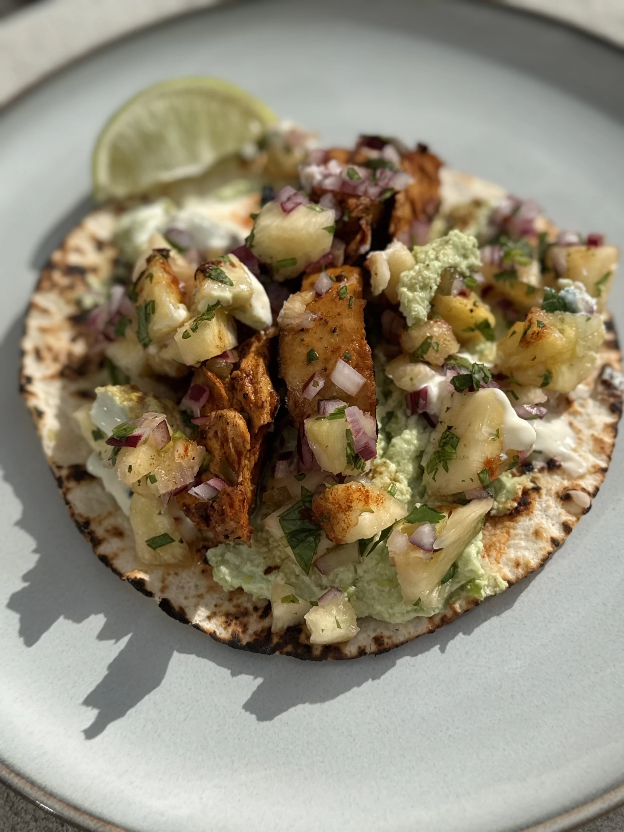 Blackened Seitan Tacos with Pineapple Salsa + Edamame Cream