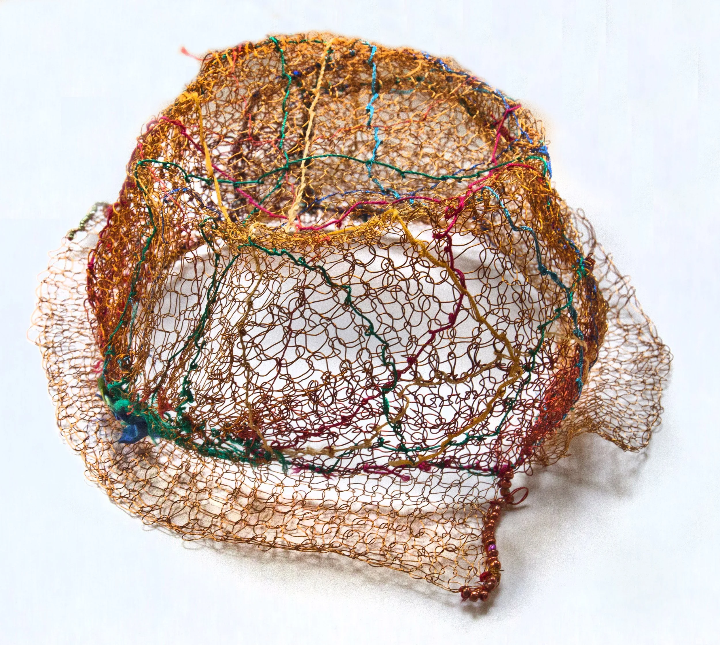 Rosie Manning, Ascot to Northbridge, 2026, knitted copper wire, glass beads, decorative threads, 10 x 24 x 25 cm