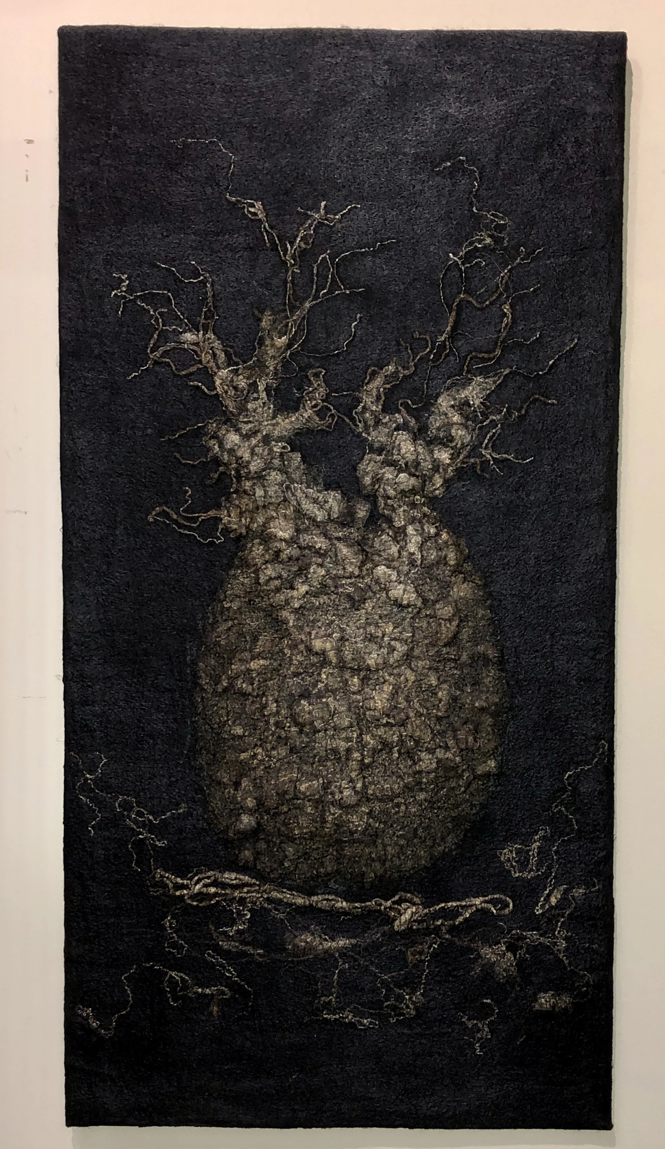 Carmen Tyrer, Boab at dusk, 2025, felt on wood, 90x40cm.