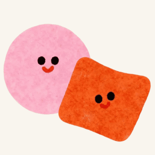 A pink round cookie and an orange square cracker, both with smiling faces and black eyes.